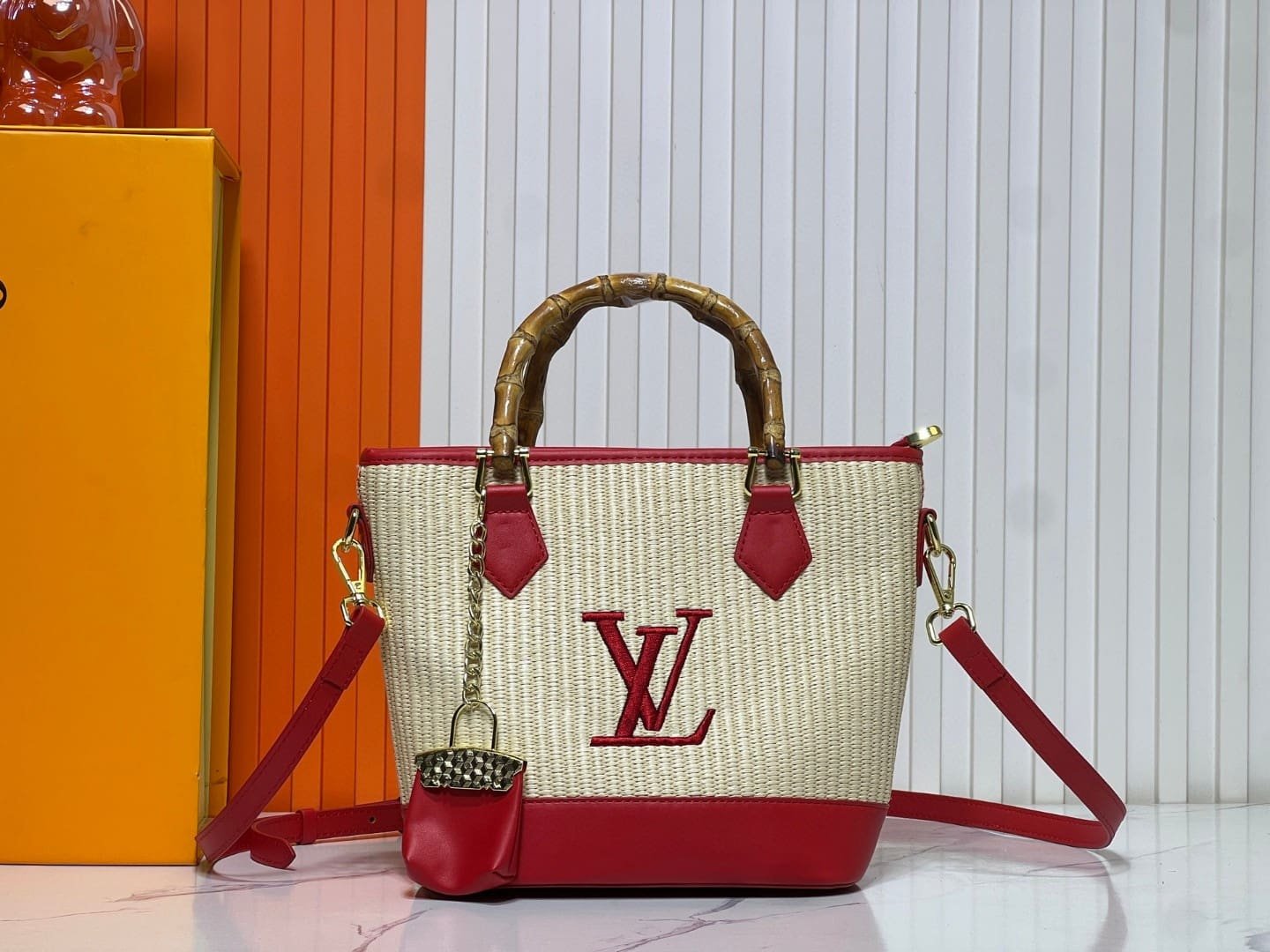 97b32484c24115756b347a0dc0c8992c Louis Vuitton Raffia Petit Bucket Tote - Image 1
