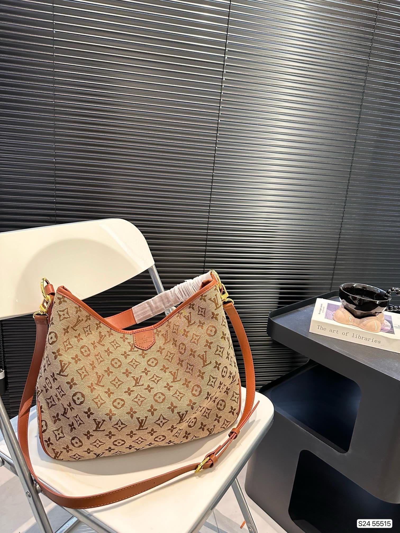 VXKY2F4s-IMG_668420240612-220320 Louis Vuitton CarryAll 55515 - Image 1